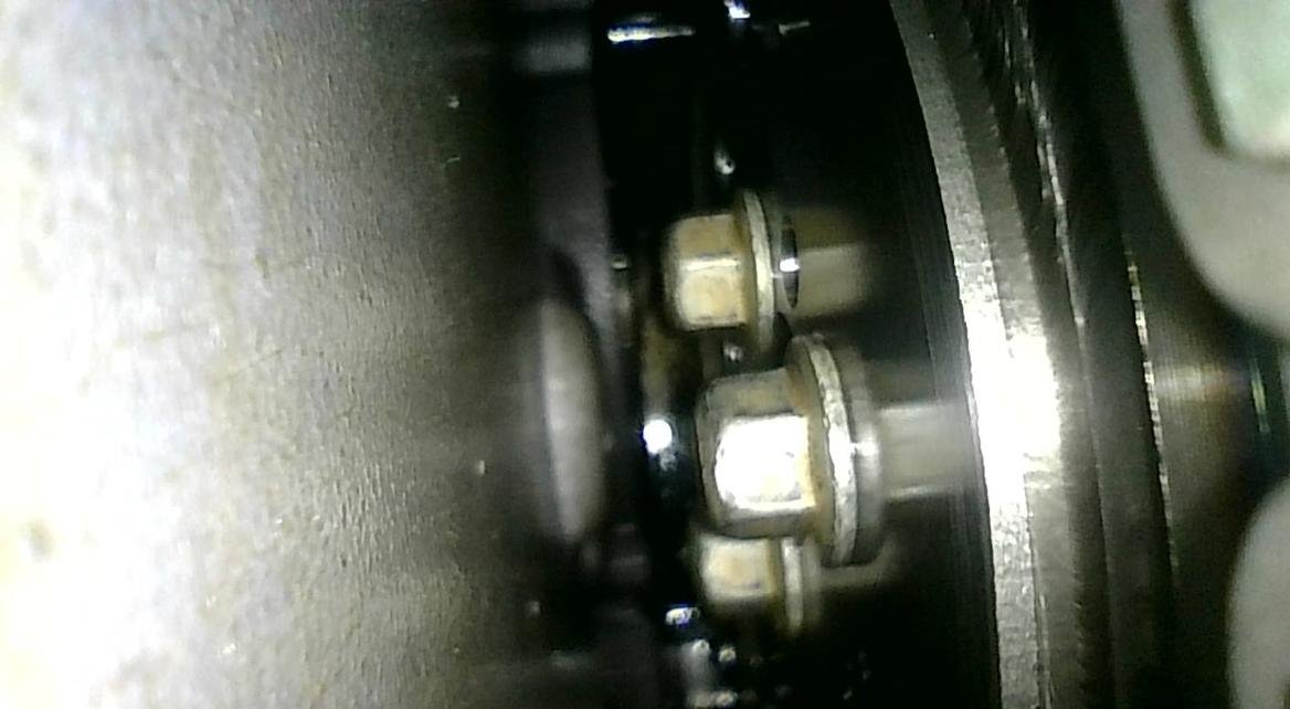 Valley cover off: inspecting the cam bolts